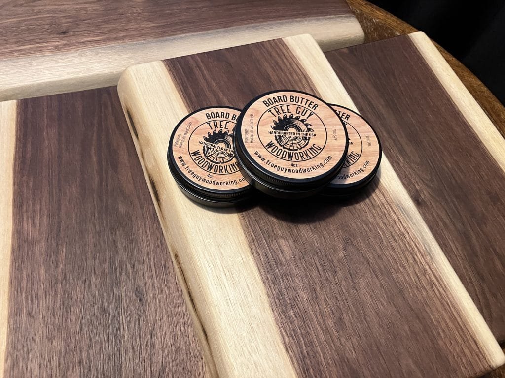 a group of round wooden coasters on a wooden surface