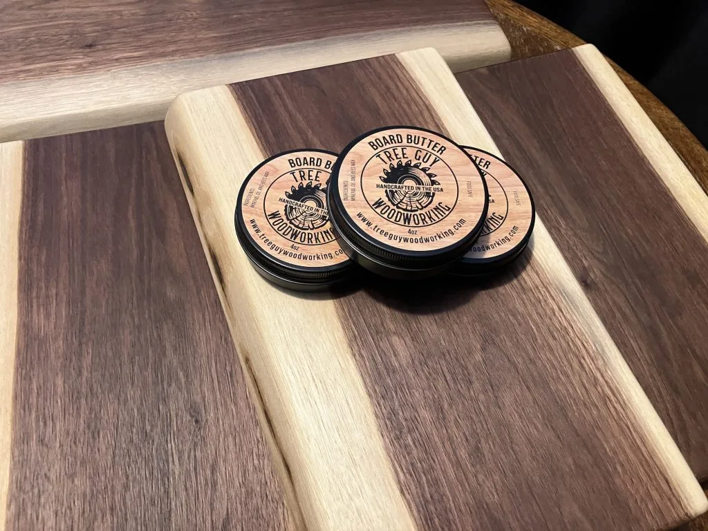 a group of round wooden coasters on a wooden surface