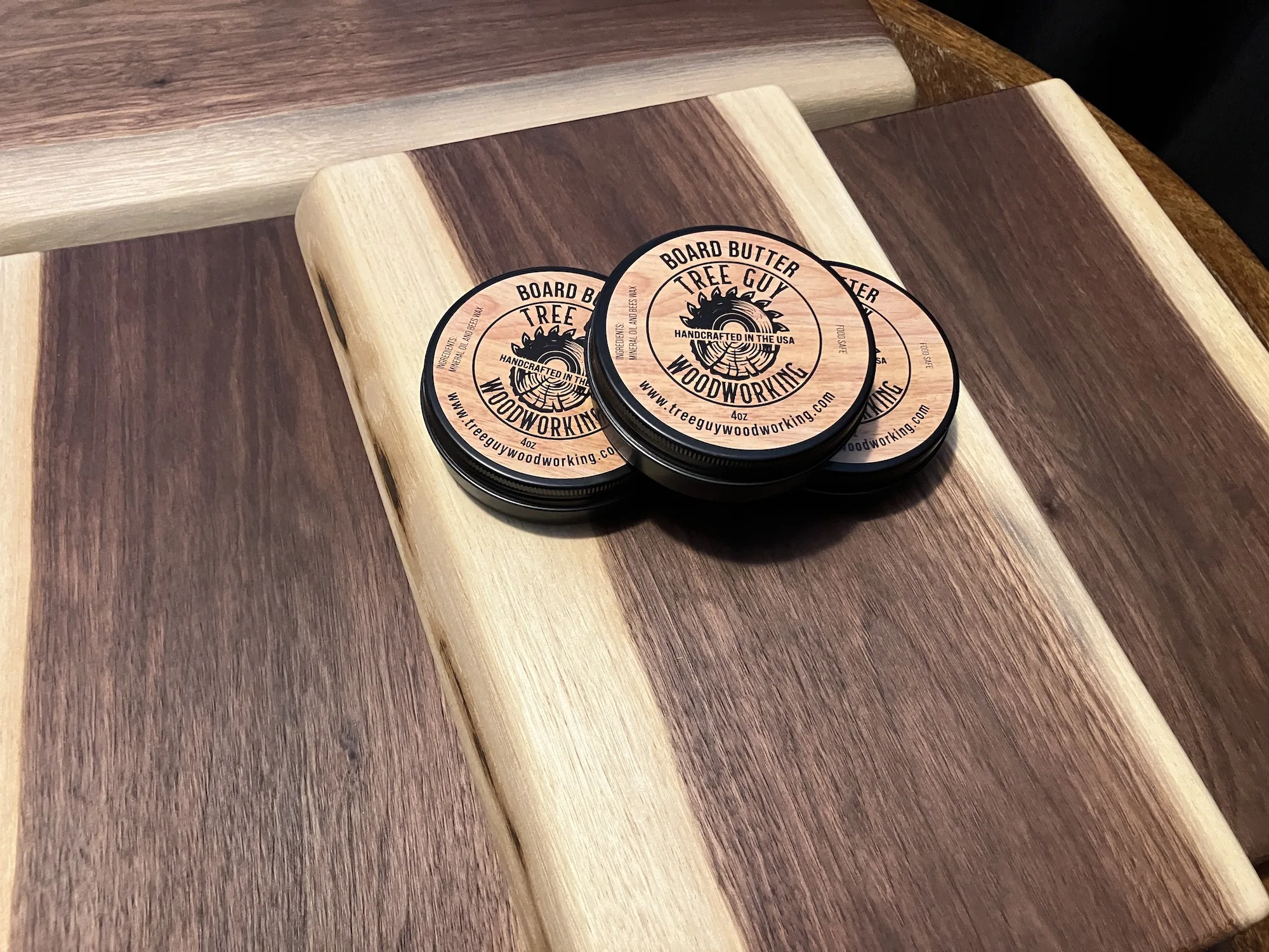 a group of round wooden coasters on a wooden surface